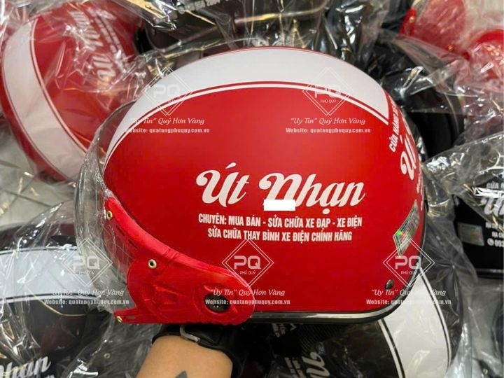 IN MŨ BẢO HIỂM XE ĐIỆN