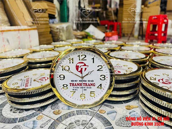Đồng hồ in logo cửa hàng điện máy - điện thoại - vật liệu Thanh Trang