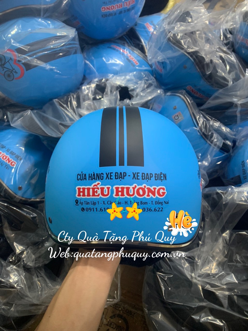 gia công mũ bảo hiểm in logo uy tín